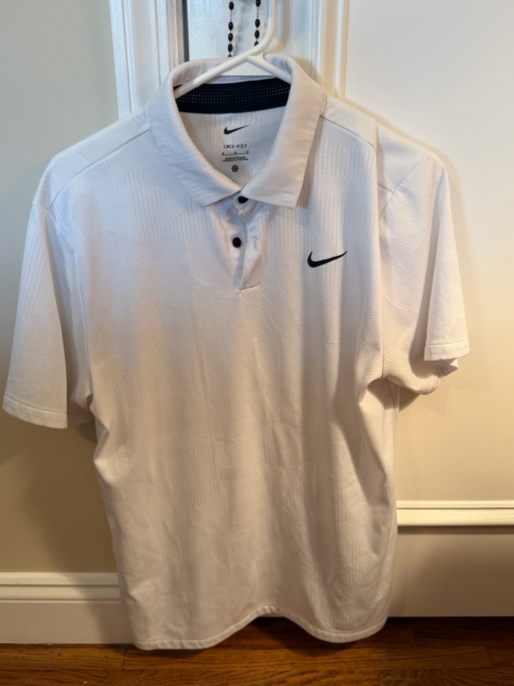 Nike White Men’s Dri-FIT Polo with Black Swoosh